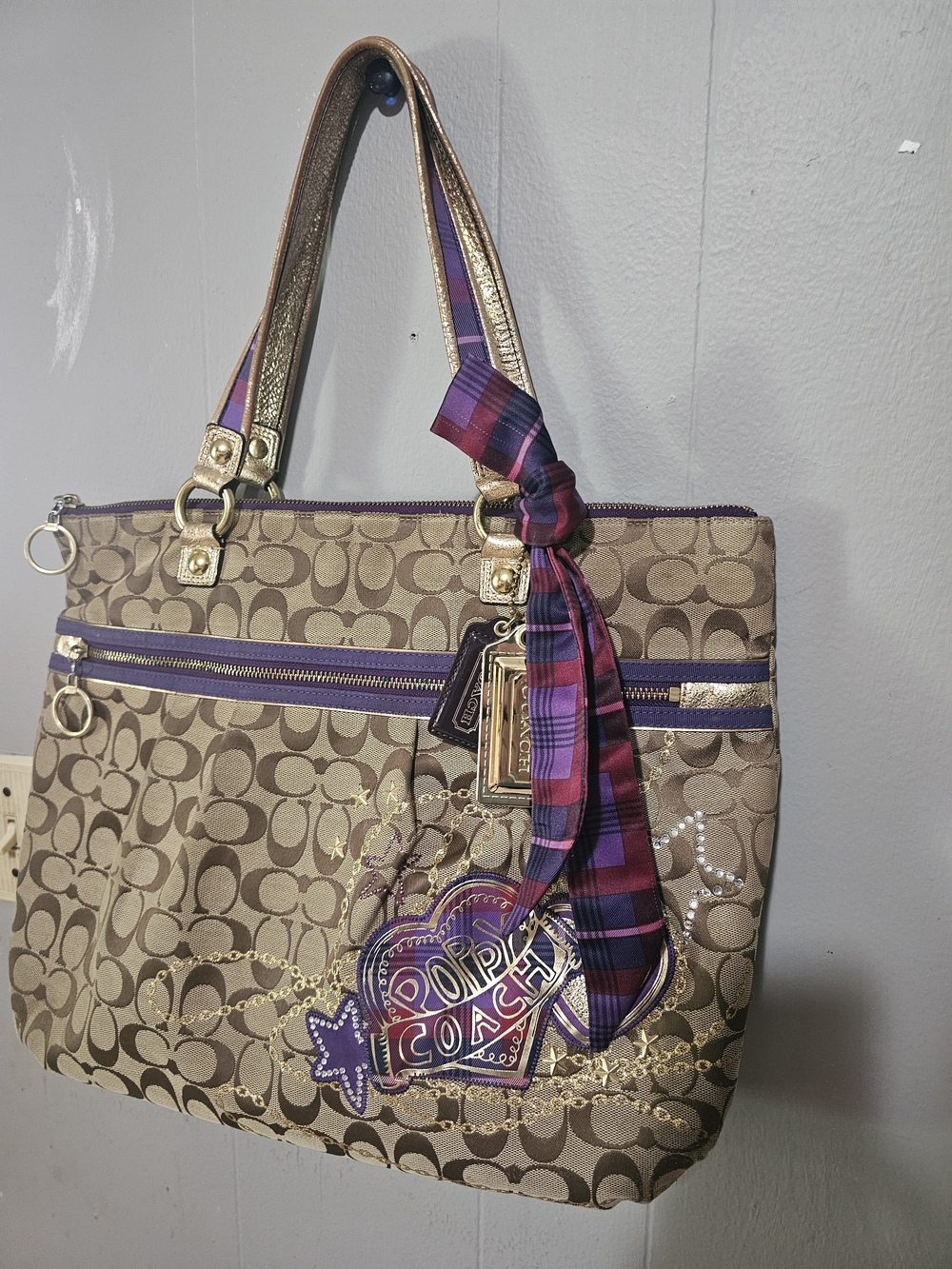 Coach Poppy Brown Signature Tote with Purple Accents.
